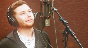 Scotty McCreery Leads Cast Of Country Singers In Cover Of ‘Angels Among Us’