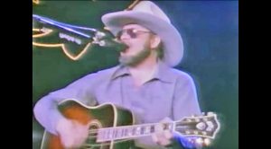 After Guitar String Breaks During Performance, Hank Jr. Proves How Much Of A Bad Ass He Is