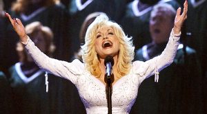 Dolly Parton Urges All To Forgive With Ode To Jesus Christ, “He’s Alive”