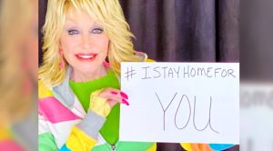 Dolly Parton Says She’s “Living On Faith” & Still Wears Makeup In Quarantine