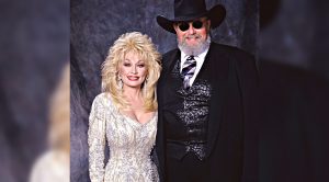 “Heartbroken” Dolly Parton Mourns Death Of Charlie Daniels