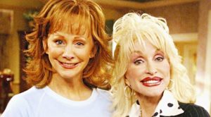 Dolly Lends Reba A Helping Hand With All-New “Does He Love You”