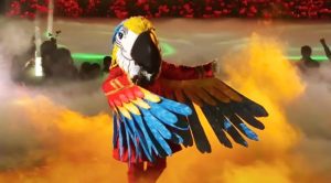 Macaw Delivers Tender Cover Of Tim McGraw’s “Live Like You Were Dying” On “The Masked Singer”