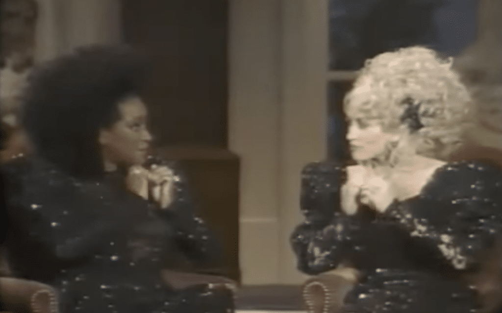 Patti LaBelle and Dolly Parton play "Shortnin' Bread" on their nails.