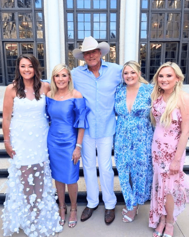 Alan Jackson and his wife Denise with their three daughters