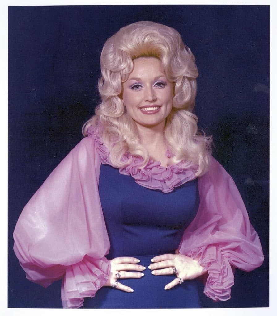 One of Dolly's many colorful looks throughout the decades is highlighted in her new book.
