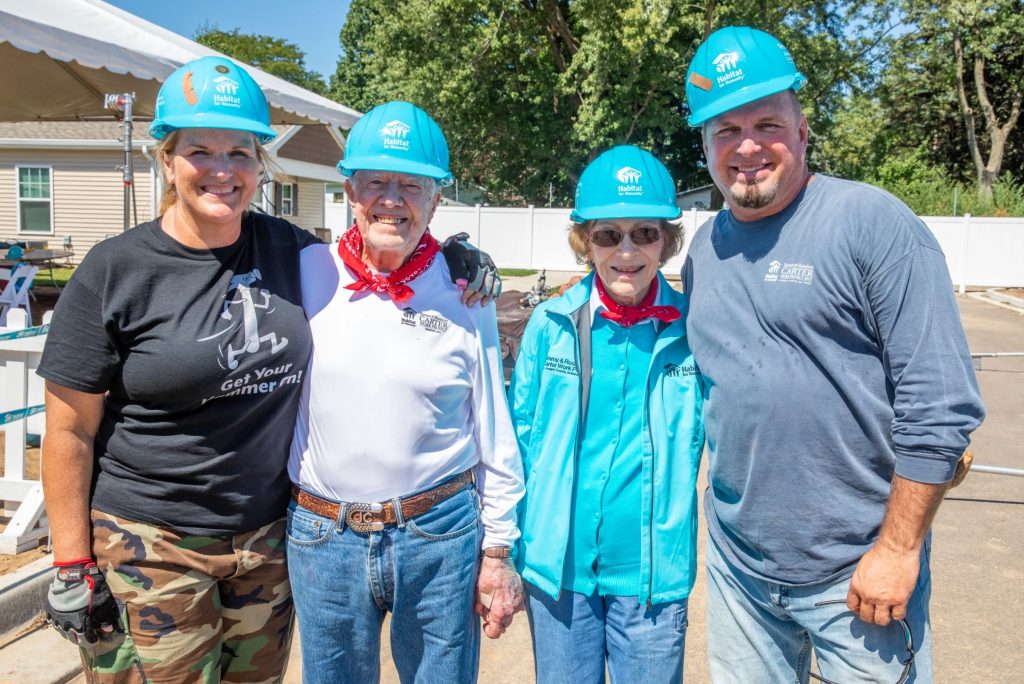 Jimmy and Rosalynn Carter with Trisha Yearwood and Garth Brooks during the 2018 Jimmy & Rosalynn Carter Work Project in Indiana.
