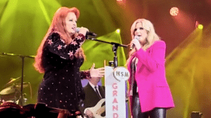 Wynonna & Trisha Yearwood Join Forces For “Cry Myself To Sleep” Duet At The Opry
