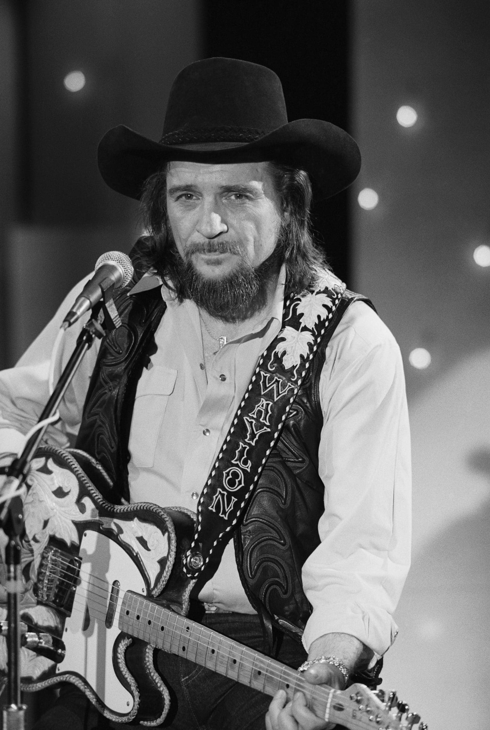LOS ANGELES - JUNE 2: Country musician Waylon Jennings performs onstage wearing a cowboy hat with a Fender Telecaster electric guitar on June 2, 1983 in Los Angeles, California. (Photo by Michael Ochs Archives/Getty Images)