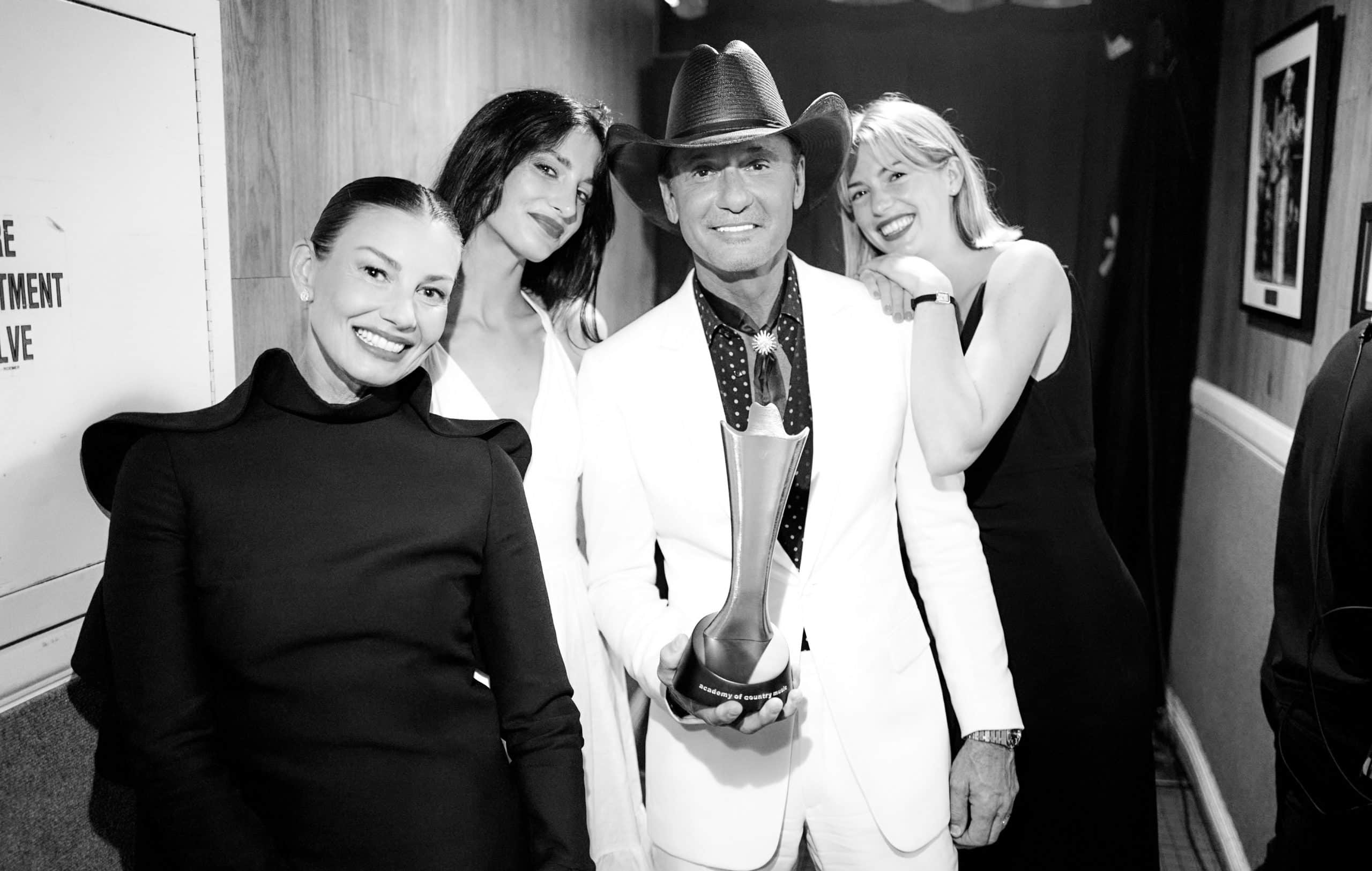 NASHVILLE, TENNESSEE - AUGUST 23: (EDITORS NOTE: Image has been converted to black and white and retouched) (L-R) Faith Hill, Audrey McGraw, Tim McGraw and Maggie McGraw pose backstage at the 16th Annual Academy of Country Music (ACM) Honors at Ryman Auditorium on August 23, 2023 in Nashville, Tennessee.