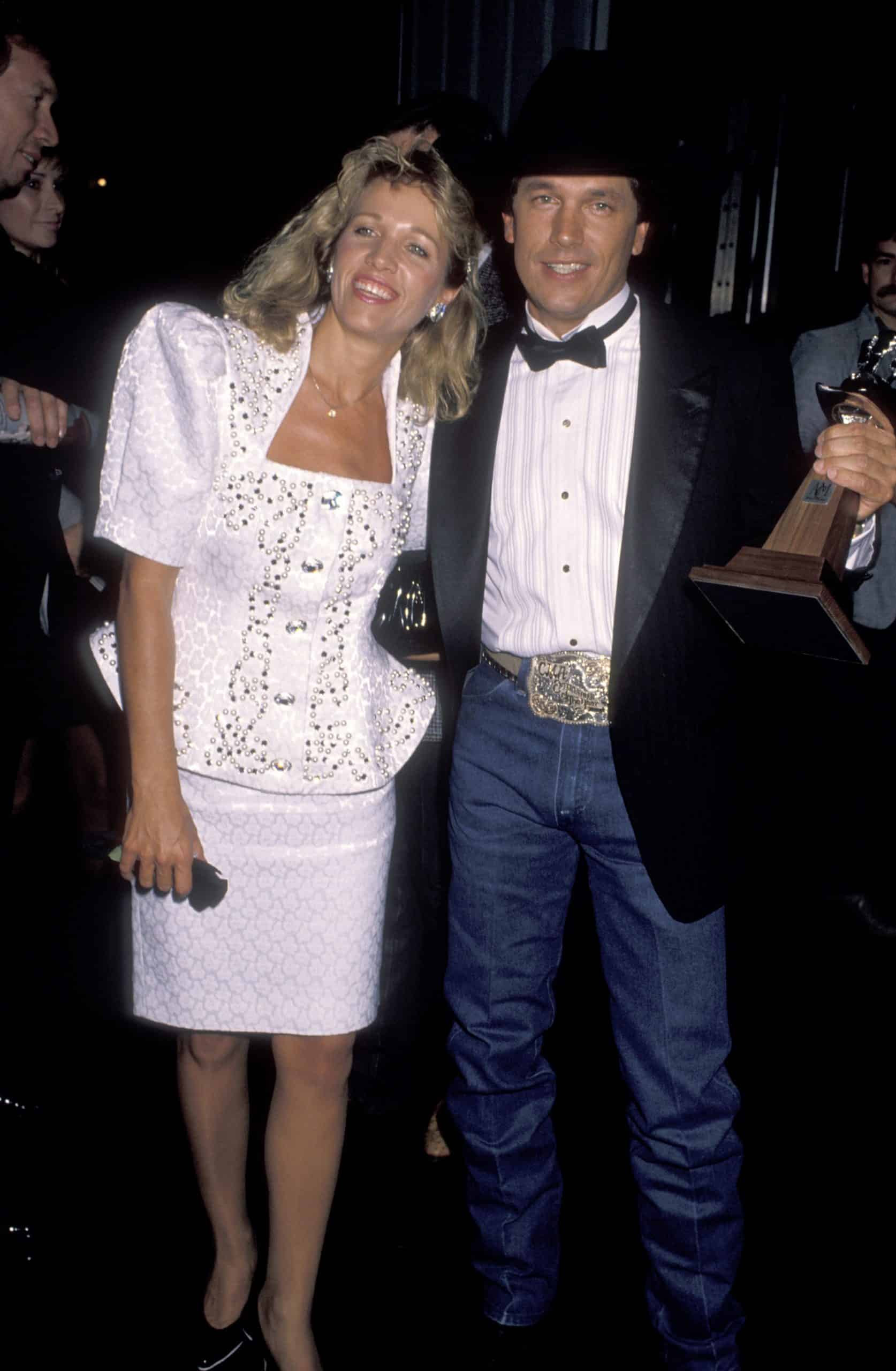 George Strait's wife, Norma, attends the 25th ACM Awards with him.