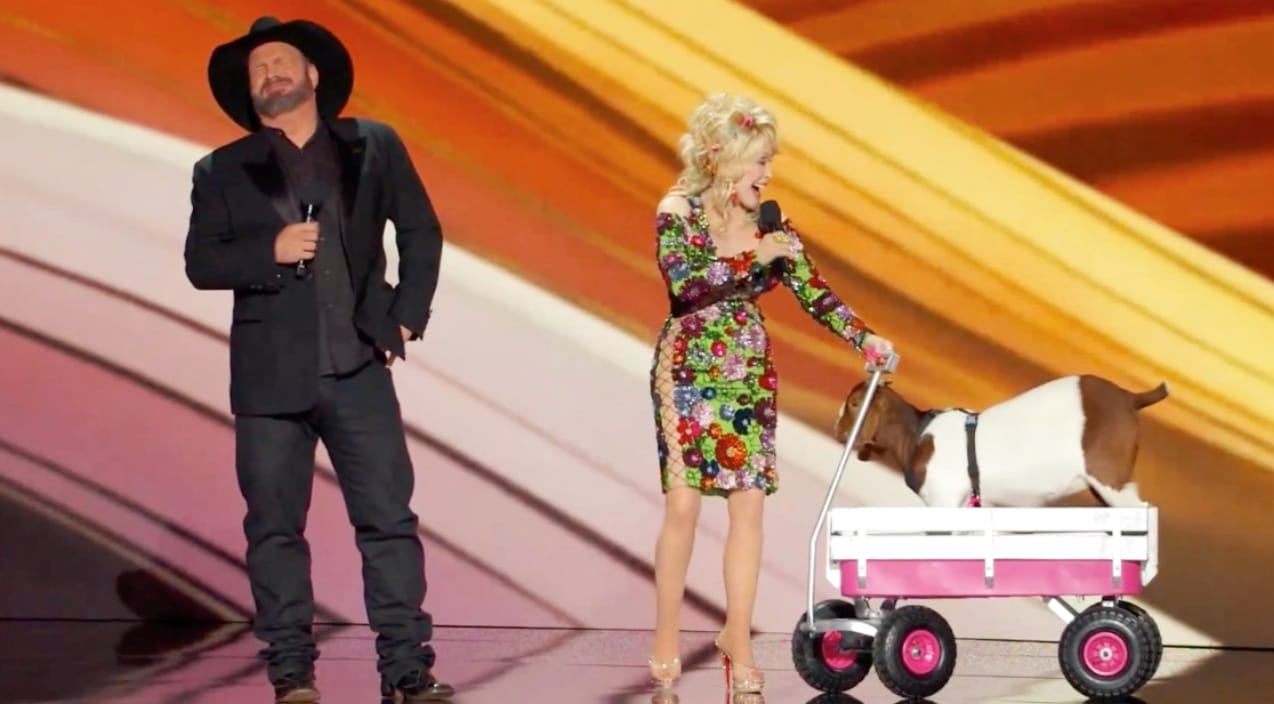 Dolly Parton and Garth Brooks bring a goat onstage while hosting the ACM Awards in 2023