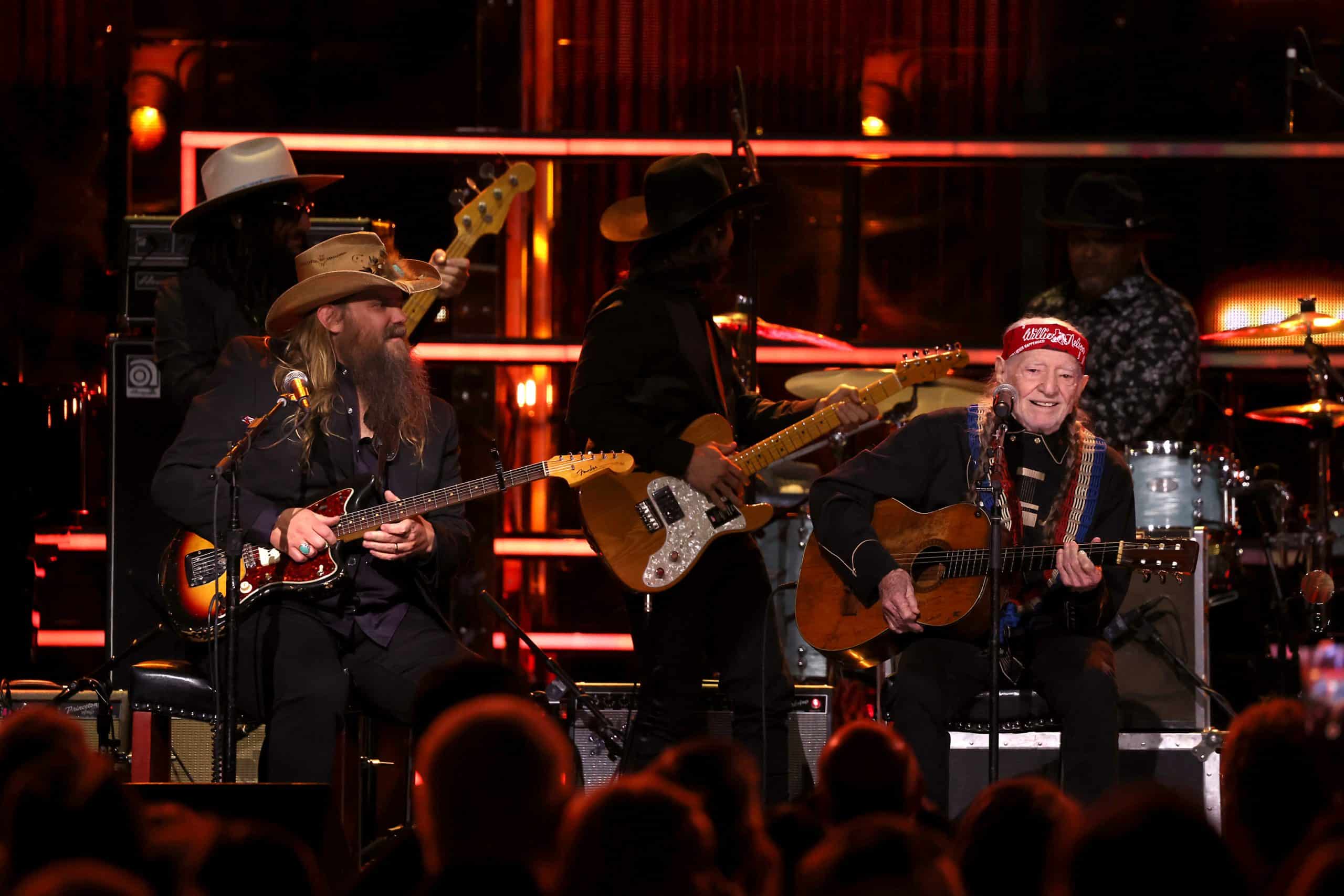NEW YORK, NEW YORK - NOVEMBER 03: Chris Stapleton and Willie Nelson perform onstage during the 38th Annual Rock & Roll Hall Of Fame Induction Ceremony at Barclays Center on November 03, 2023 in New York City. (Photo by Kevin Kane/Getty Images for The Rock and Roll Hall of Fame )