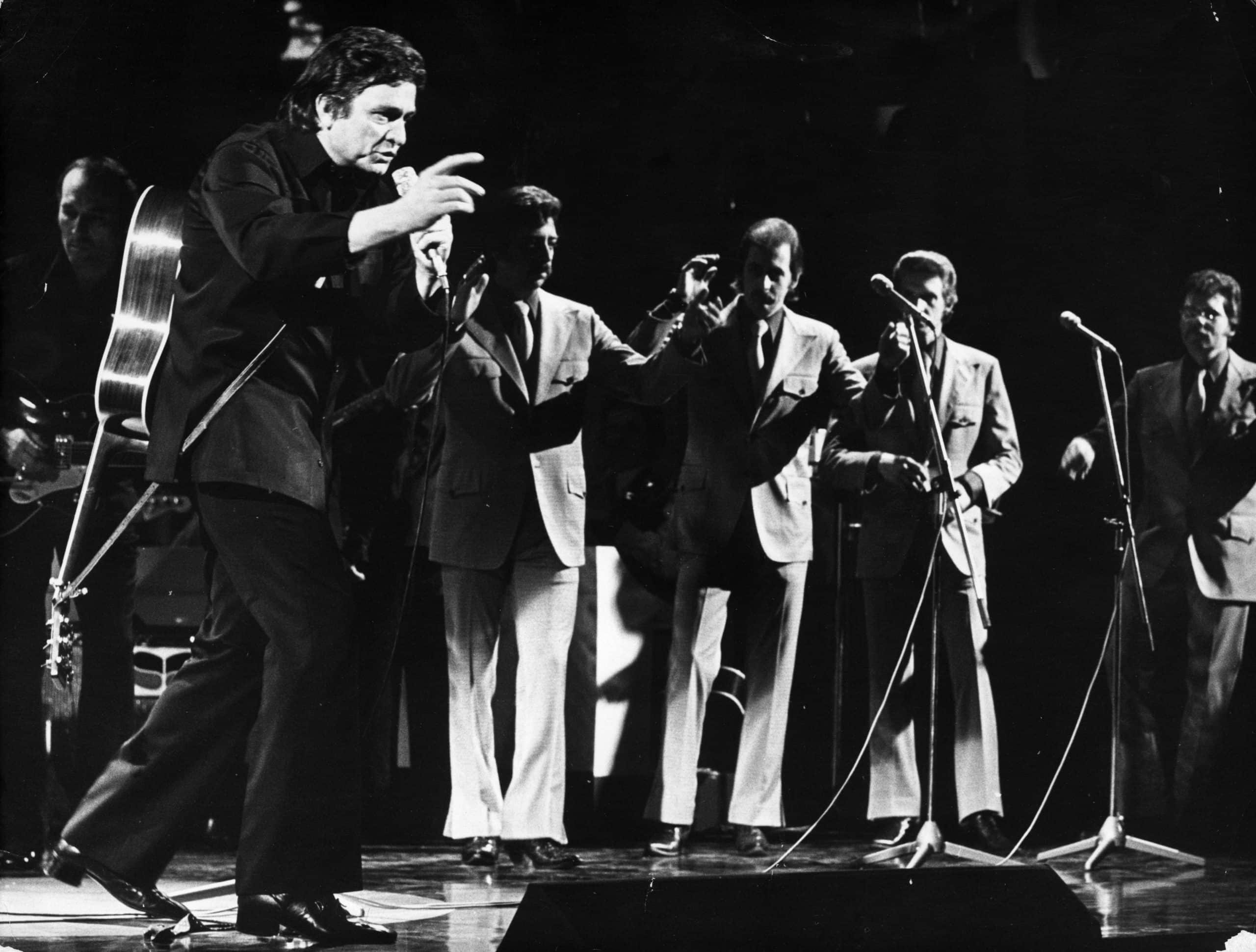 Johnny Cash sings during a show in 1972