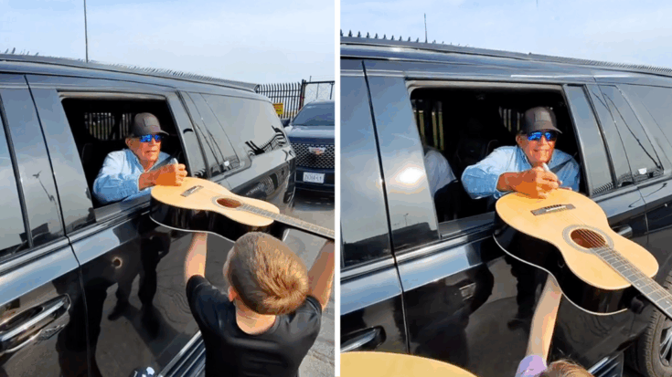 george strait signs guitars for fans